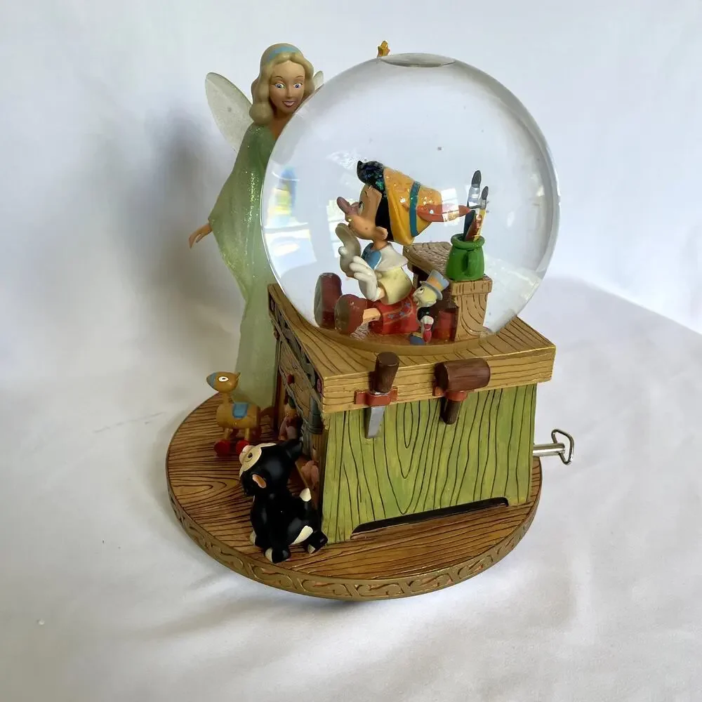 Disney‎ Pinocchio and the blue fairy snowglobe collectible plays 